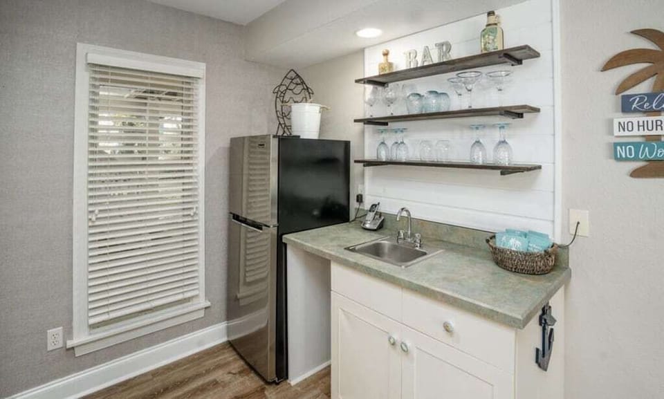 Wet bar with full size refrigerator