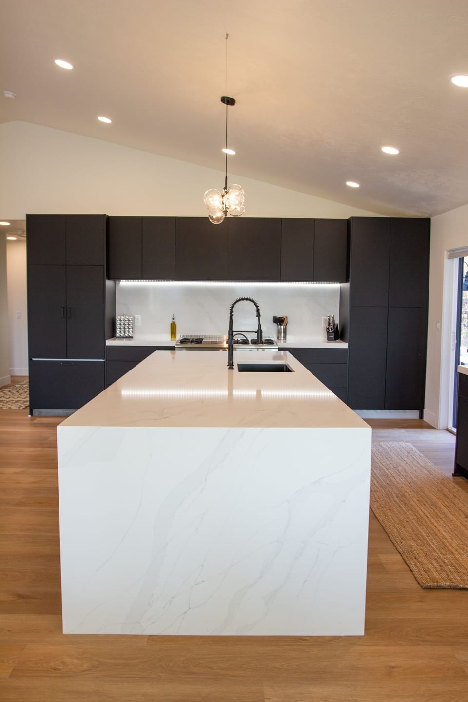 Stunning kitchen complete with 48" gas range, oversized island, bar seating.