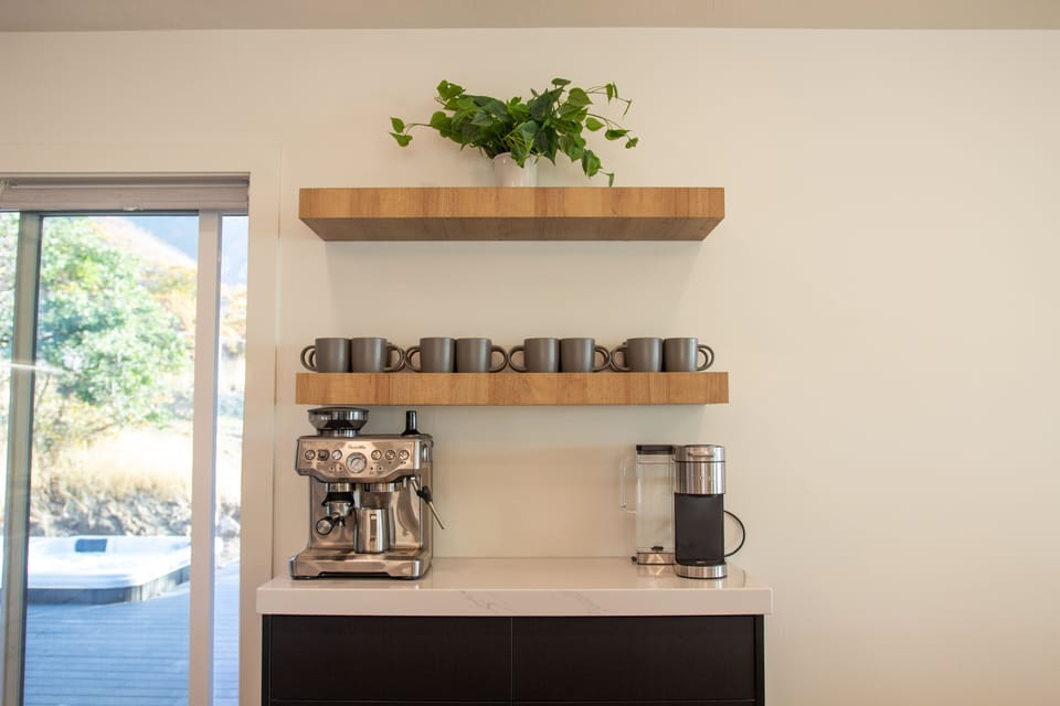 Coffee bar complete with espresso machine and keurig.
