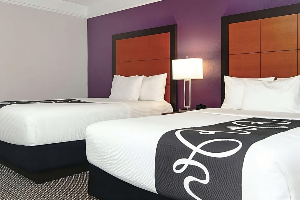 Recharge after a long day in clean, cozy double beds.