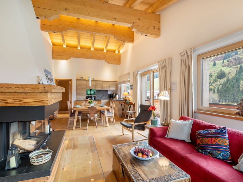 Table, Couch, Furniture, Property, Wood, Picture Frame, Lighting, Chair, Interior Design, Living Room