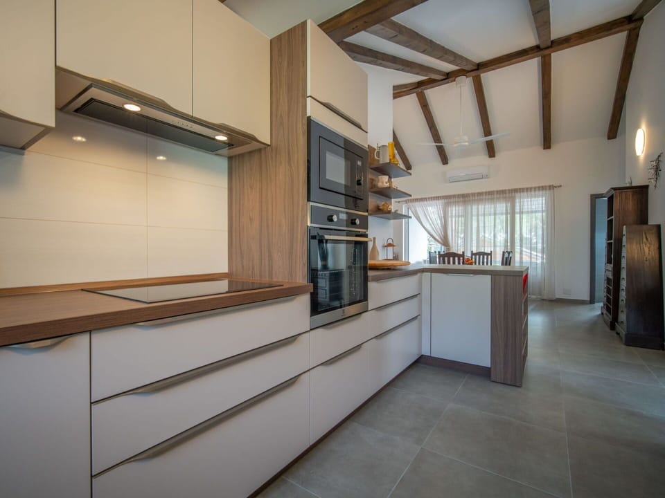 Cabinetry, Property, Building, Countertop, Wood, Kitchen, Interior Design, Flooring, Floor, Kitchen Appliance