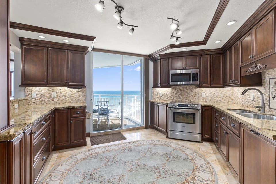 Kitchen looking east over the south balcony toward the Atlantic Ocean.
