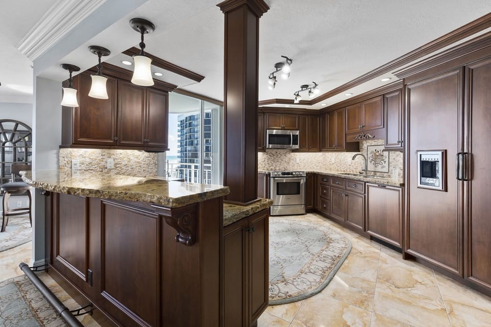 Kitchen looking southeast over the balcony toward the Atlantic Ocean & neighbors