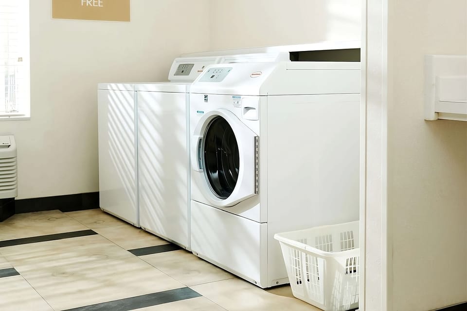 Refresh your wardrobe easily with bright, on-site laundry machines.
