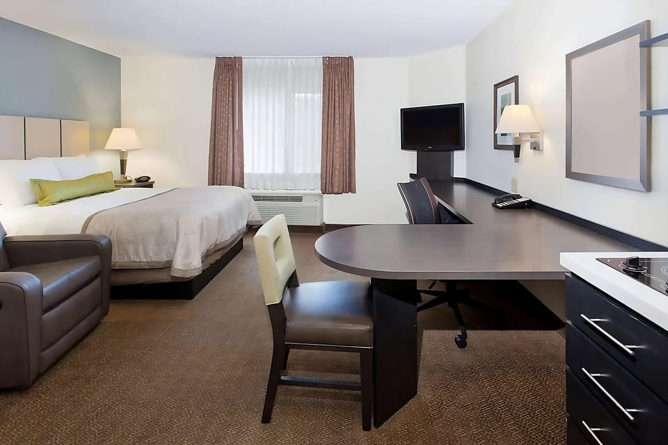 Unwind after work with roomy seating and a dedicated desk.