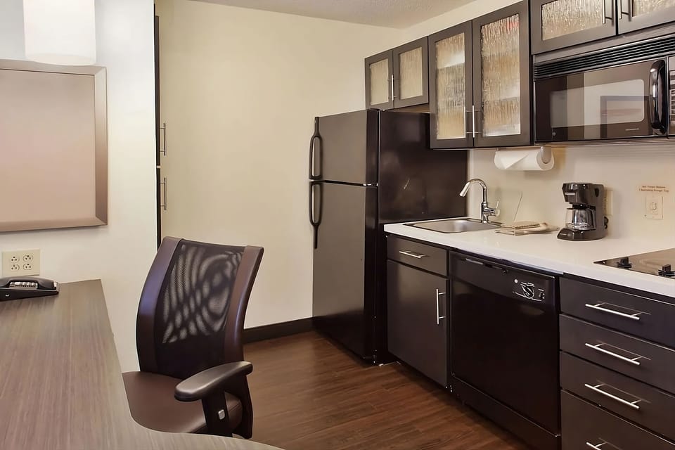 Cook simple meals easily with the modern in-room kitchenette.