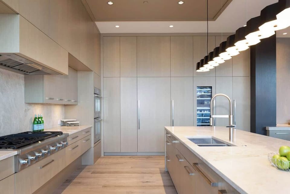 - Modern kitchen with sleek cabinetry and integrated appliances  
- Bright design featuring spacious counters and clean neutral tones  
- Perfect setup for cooking with style and mountain-view ambiance  
