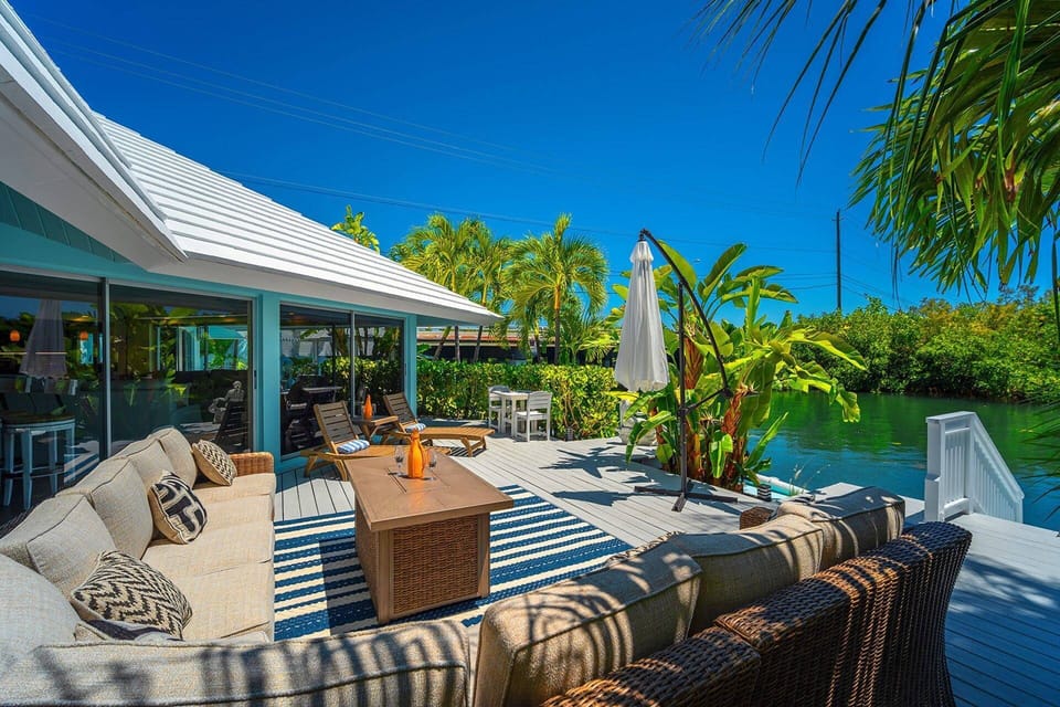 Host outdoor gatherings with ease on the spacious deck that provides captivating canal views.