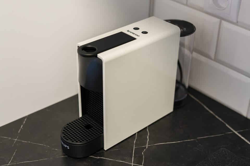 A close-up of compact and stylish kitchen equipment that adds functionality to the space.
