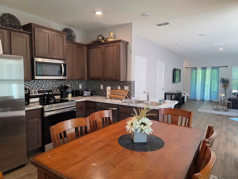 Fully equipped kitchen has modern appliances, cookware.  Everything needed for short or long stays.