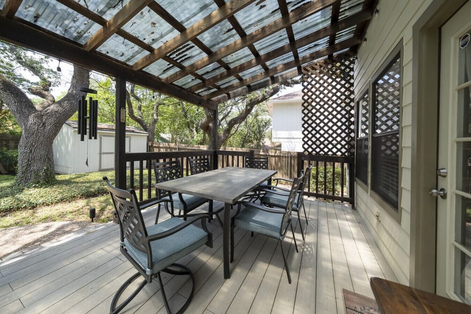 Massive covered patio - dining table on one end