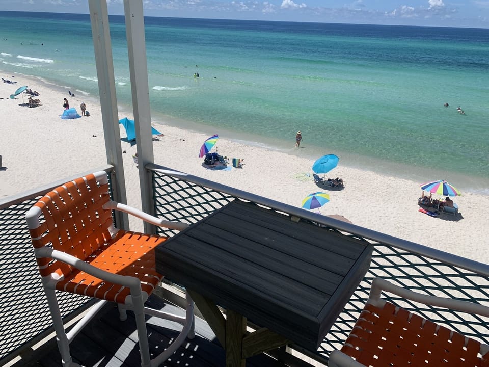 Hanging off the outside Balcony
Wow can’t get much closer to Beach
