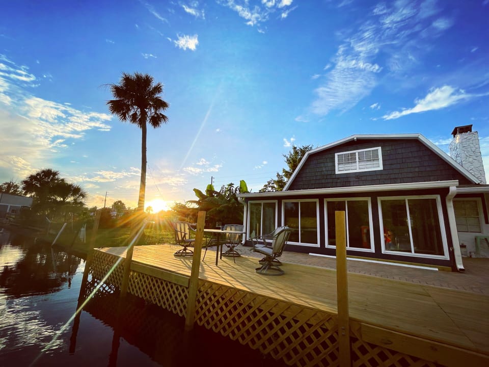 Back of the house view on canal from the floating dock!
