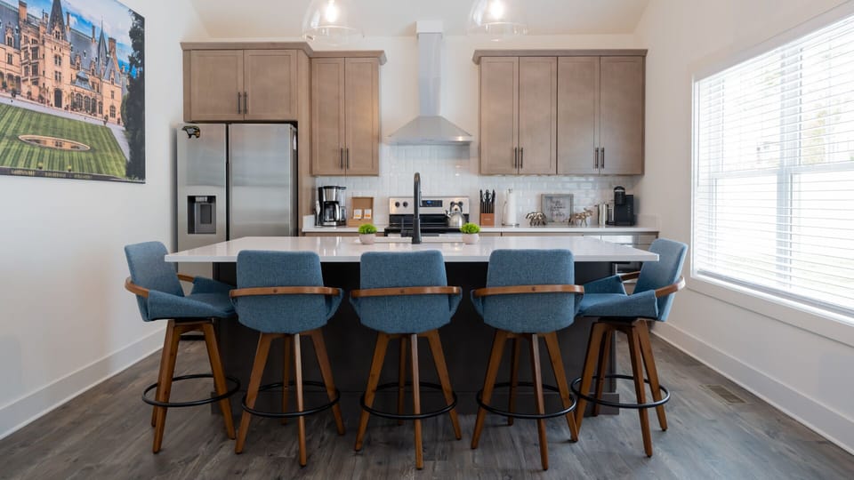 Prepare your favorite meal in our well equipped kitchen, then gather around the spacious island.