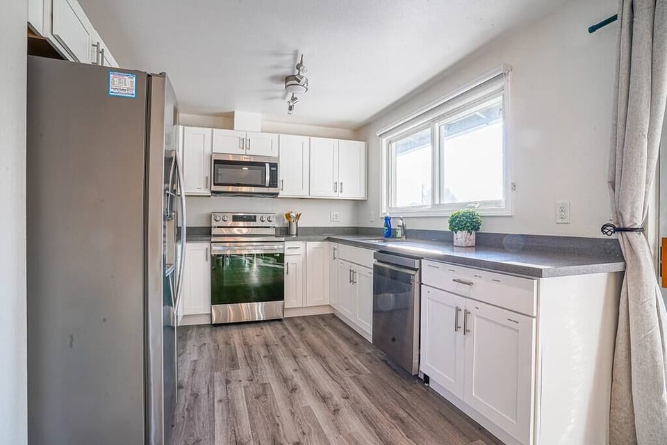 Fully stocked kitchen with stove/oven, dishwasher, microwave and refrigerator for you to whip up a meal or two