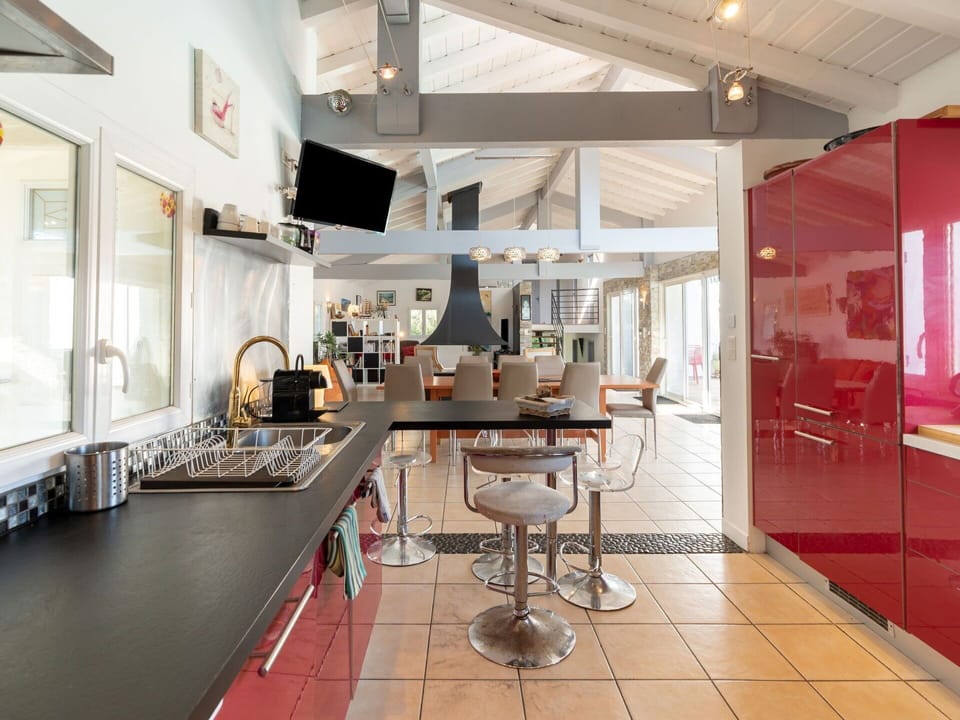 Furniture, Countertop, Building, Automotive Design, Cabinetry, Interior Design, Flooring, Kitchen, Floor, Chair