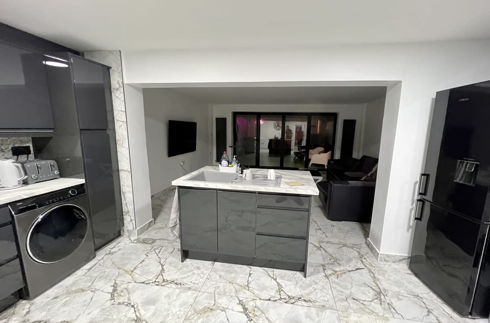 Open plan views of kitchen & living room 