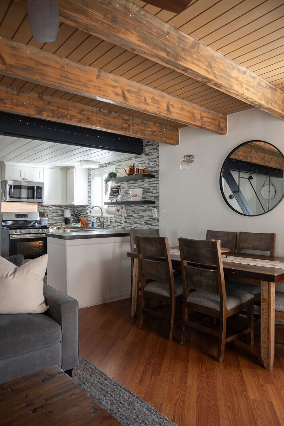 Charming Airbnb with an open-concept living and dining area, modern kitchen, and cozy seating.