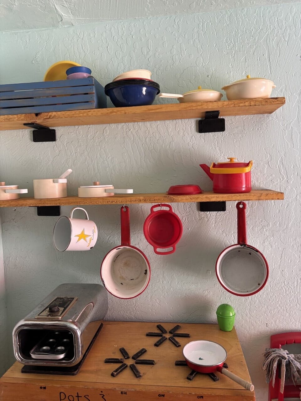 A kitchen made just for little chefs. Stocked with play cookware, dishes, and endless opportunities for creative cooking adventures.