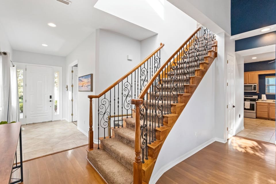 Grand staricase after entering the house.