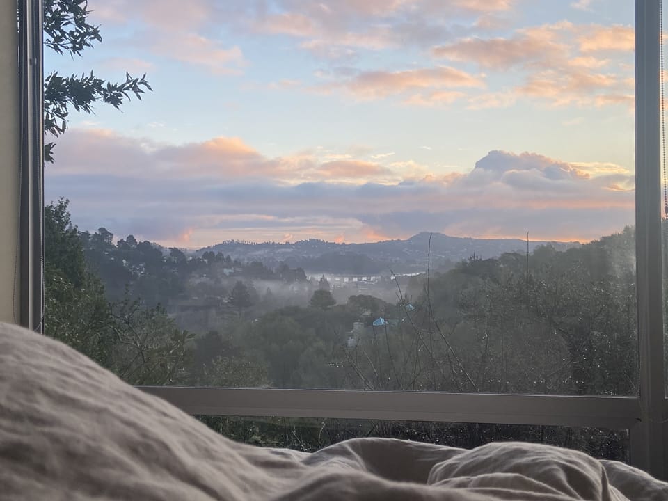 Enjoy the spectacular view from bed a 'window' wall - special in morning or eve