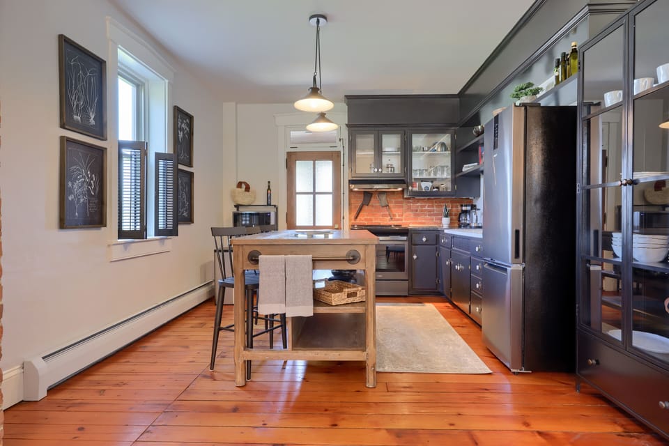 View of this lovely kitchen from the dining area.