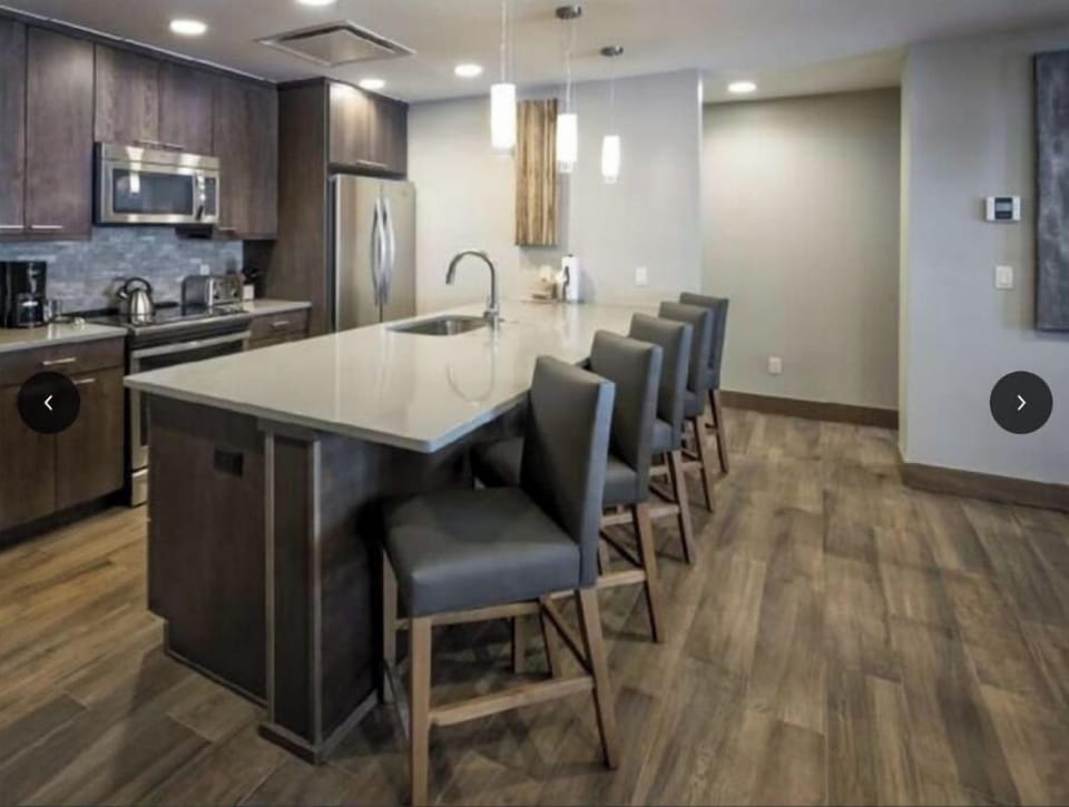 Luxury kitchen with everything you could ever need!  Island seating plus table.