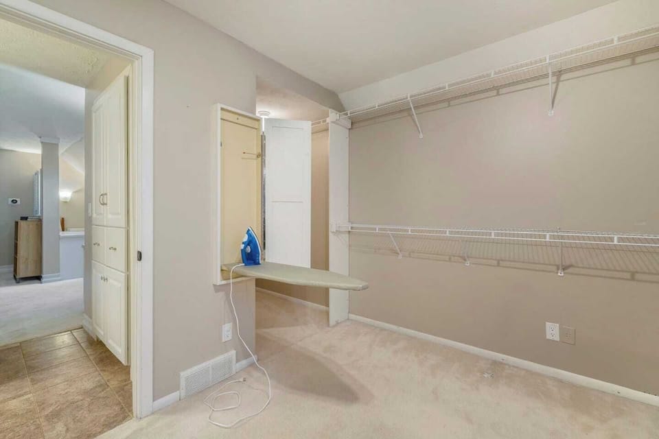Large walk-in closet in Bedroom 1.