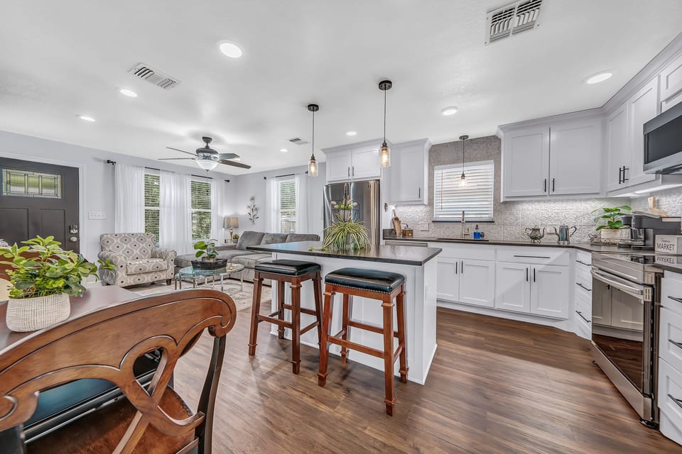 Kitchen has dishes, pots & pans, utensils, silverware, spices, 