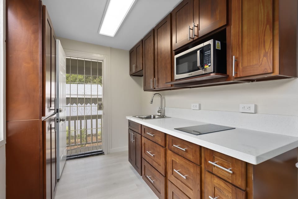 Fully stocked kitchenette.