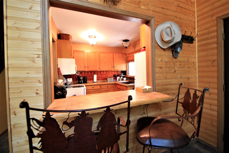 Cowpokes have their breakfast served at the bar.