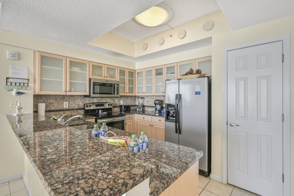 The updated kitchen has granite countertops, stainless steel appliances, and is fully stocked with more than the basics (coffee/tea bar, oils/spices, Tupperware, plenty of pots/pans/cookware) so you and your group can prepare delicious meals while overlook
