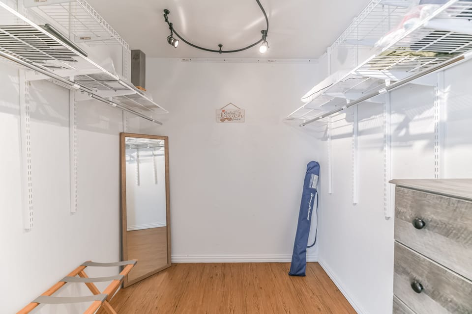 Even though you'll probably only need your shorts and swimsuits, there is a large walk-in closet in the primary