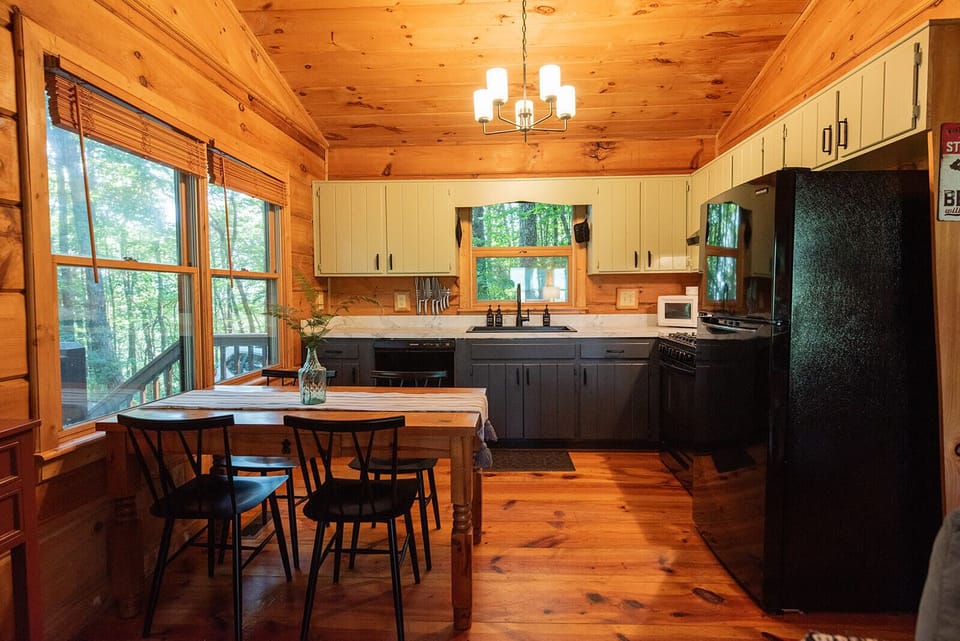 A full kitchen with dining space comfortable for 4-5. 