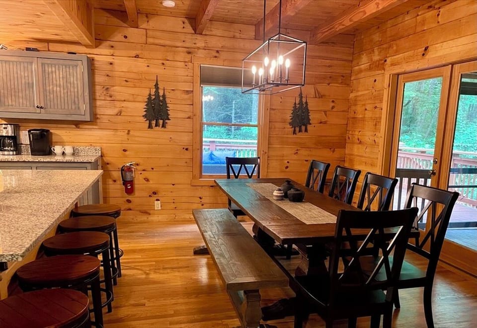 Dining Table Seats Ten with Seating for Four at the Bar