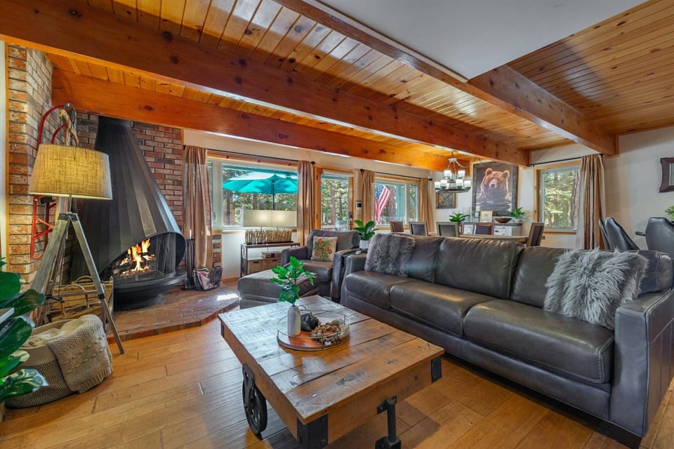 Enjoy the wood burning fireplace while relaxing on the couch.