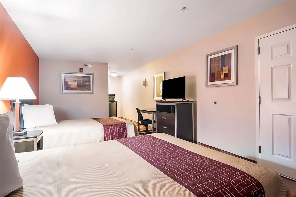 Settle in comfortably with easy access to desk and storage.