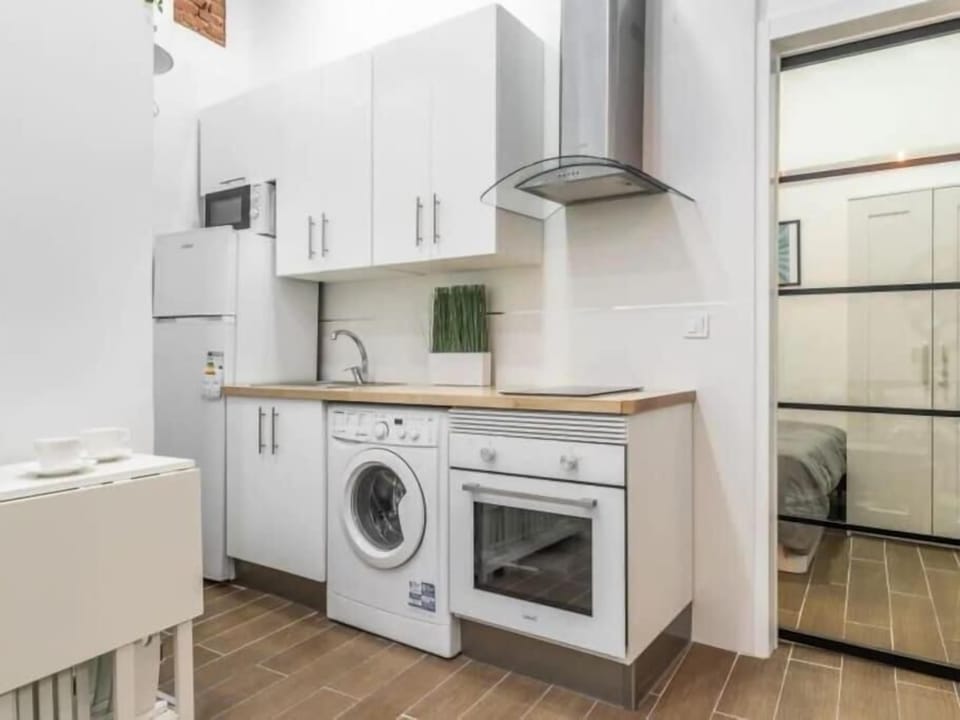 Large living room with kitchen