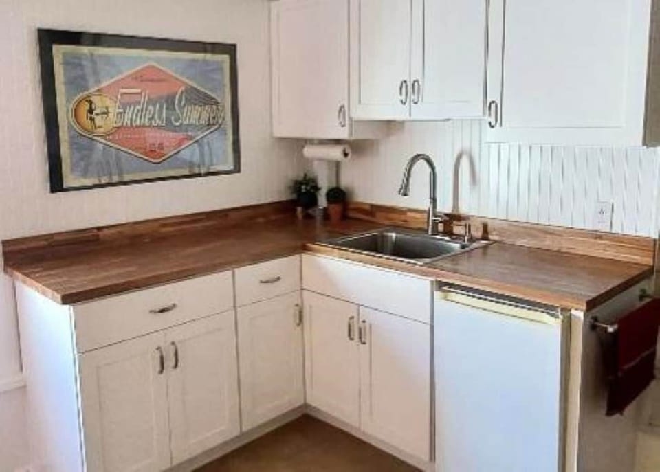 Bonus kitchenette with mini-fridge is great for entertaining!