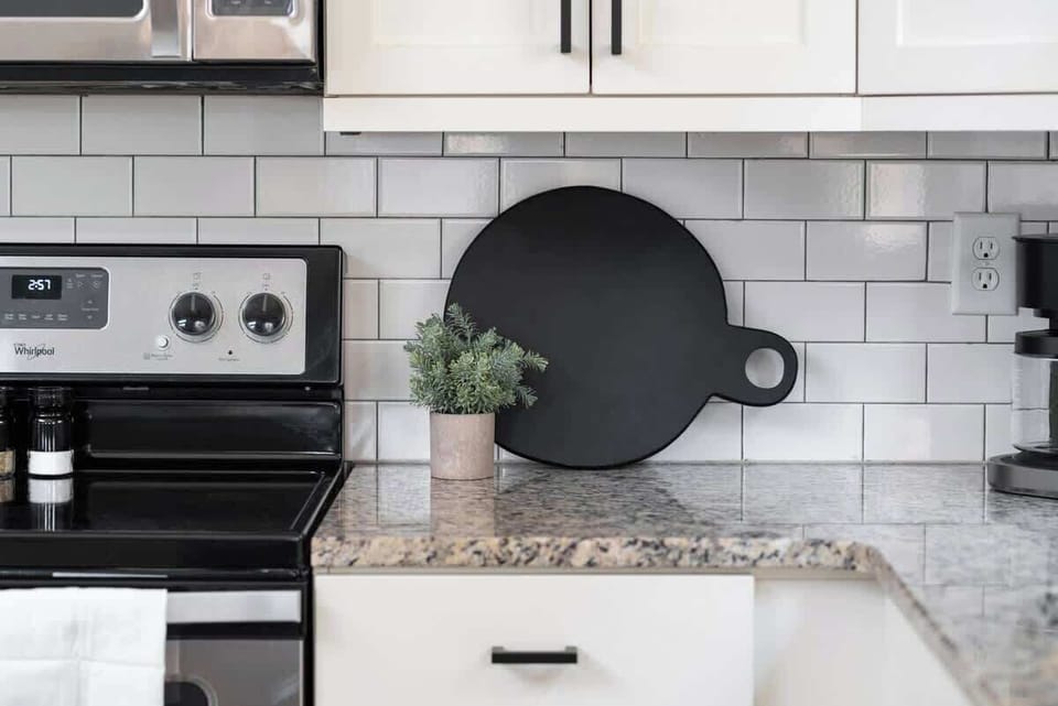 Kitchen: Sleek design meets functionality with modern appliances and chic decor for your culinary dreams!