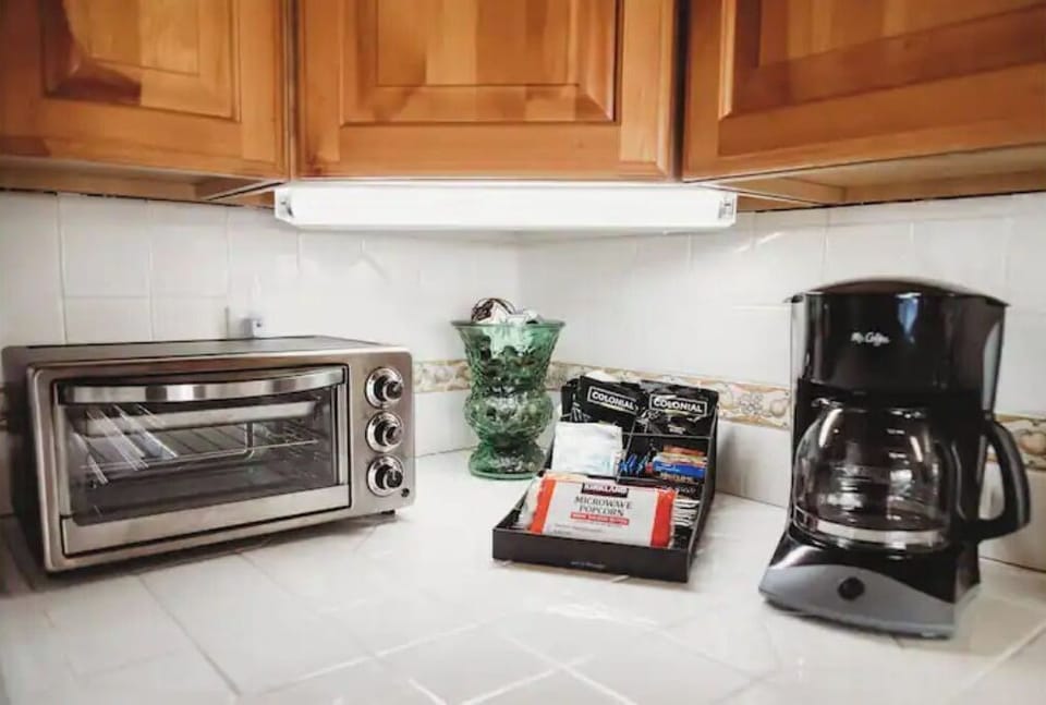 The kitchen is equipped with all the essentials. Coffee, hot cocoa and tea.
