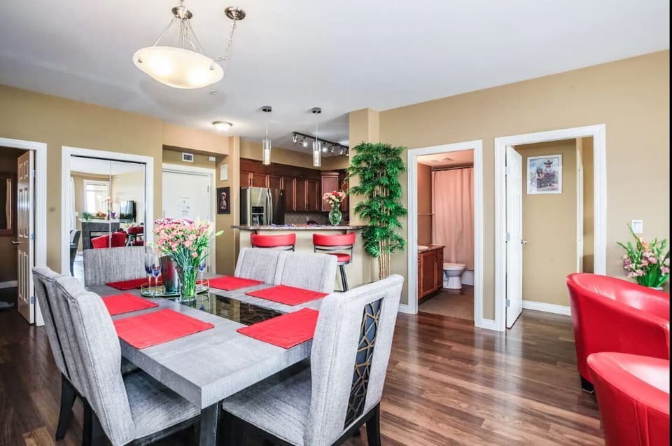 This suite has a large dining room table with enough room for six
