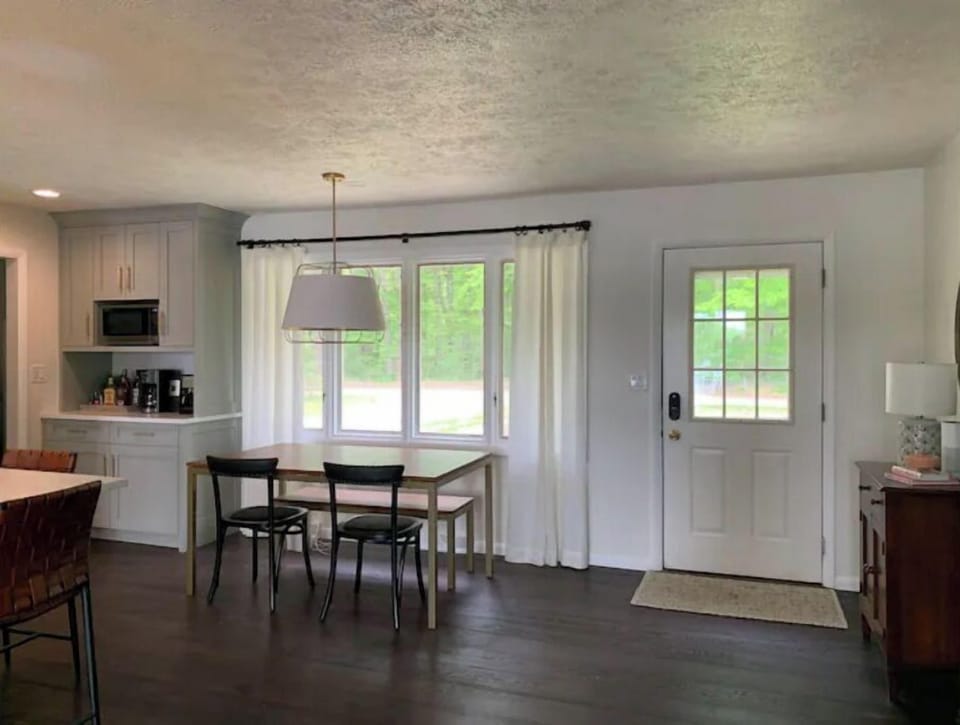 Dining table with two leaves for expansion.