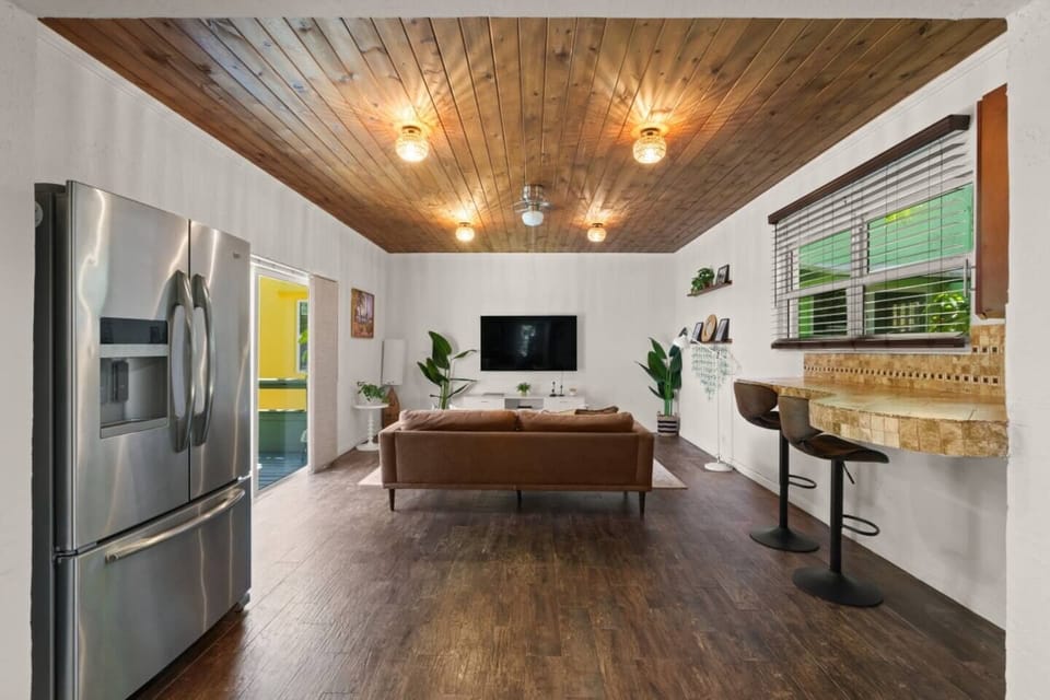 Experience the spaciousness of this open concept layout, where the living, dining, and kitchen areas seamlessly flow together, creating an inviting and airy atmosphere.