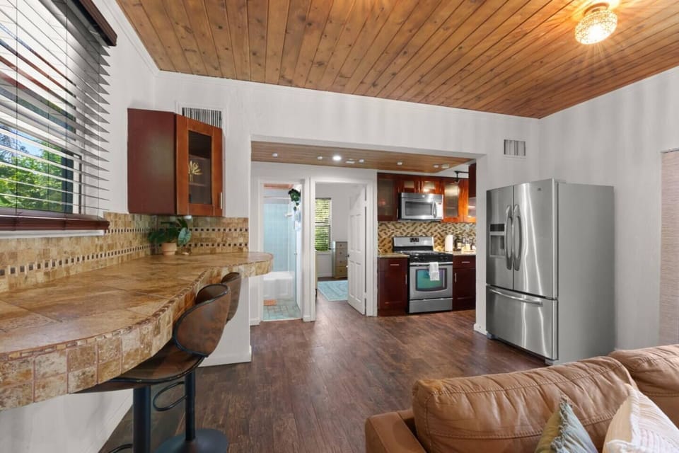 Experience the spaciousness of this open concept layout, where the living, dining, and kitchen areas seamlessly flow together, creating an inviting and airy atmosphere.