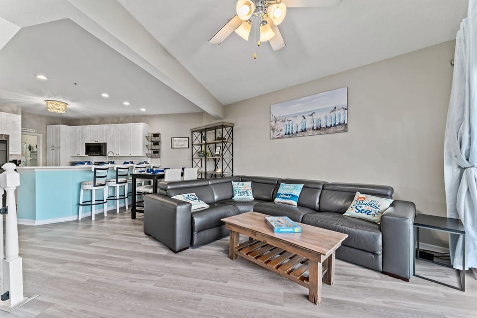 Spread out in the spacious living room that flows through the dining room, kitchen and outdoor balcony space creates a warm and inviting space for family or friends to cook, dine, play, watch your favorite movie or star gaze on the balcony together. 