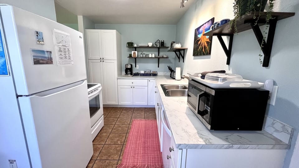 full refrigerator, stove and dishwasher