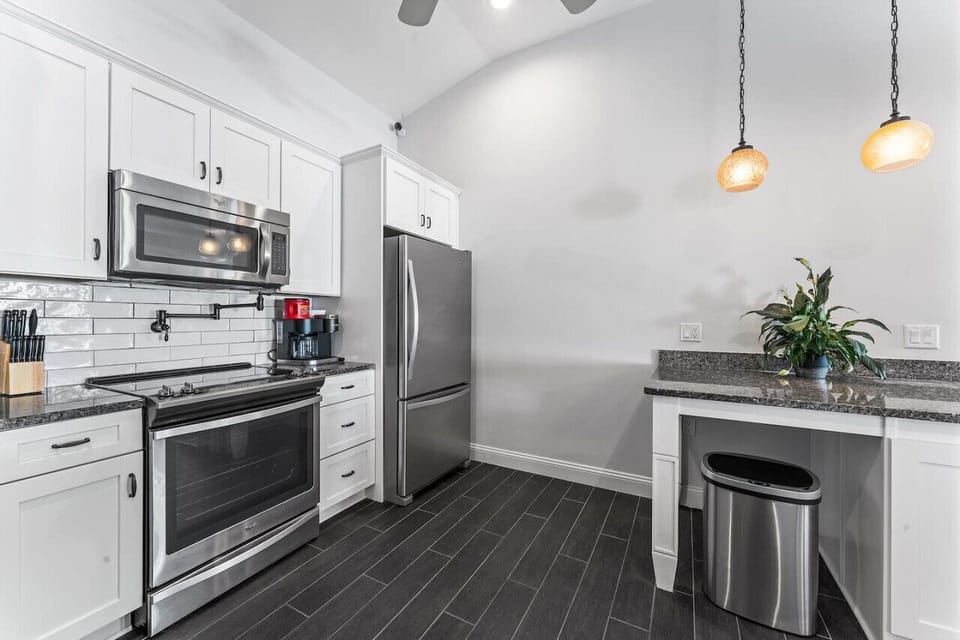 Fully stocked with cookware and dinnerware, this awesome kitchen is ready for all your culinary adventures.