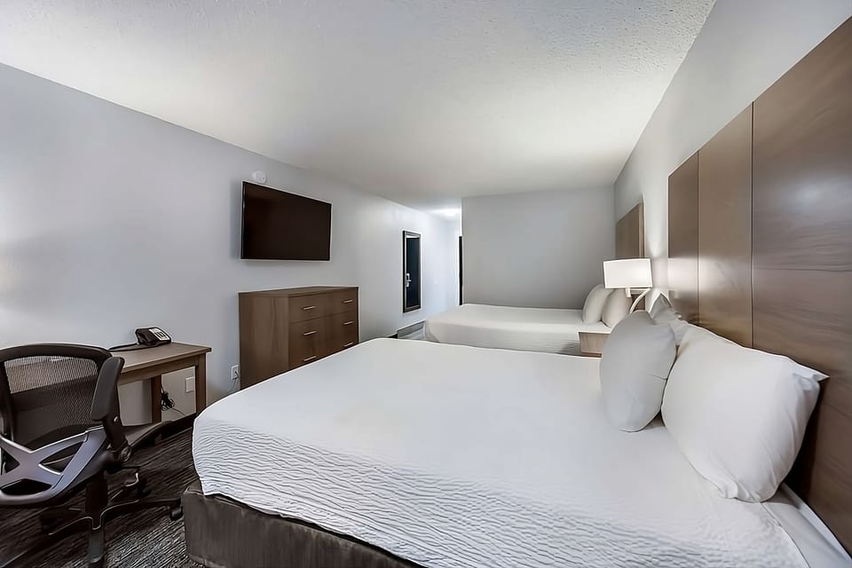 Relax into plush pillows for a quiet, restful night.